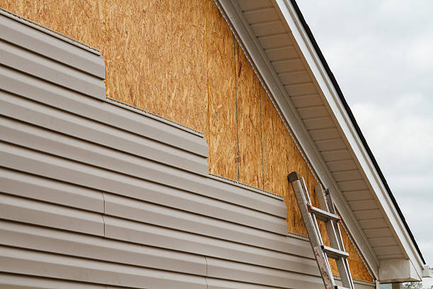 Professional Emergency Siding Repair technician working in Sharon, PA